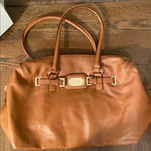 Michael Kors Duffle. Small scratch